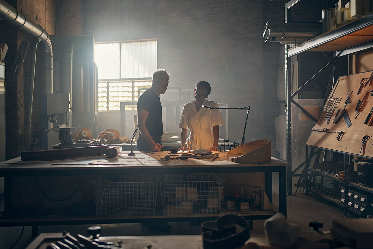 Founder David King and a King Living designer in the studio.